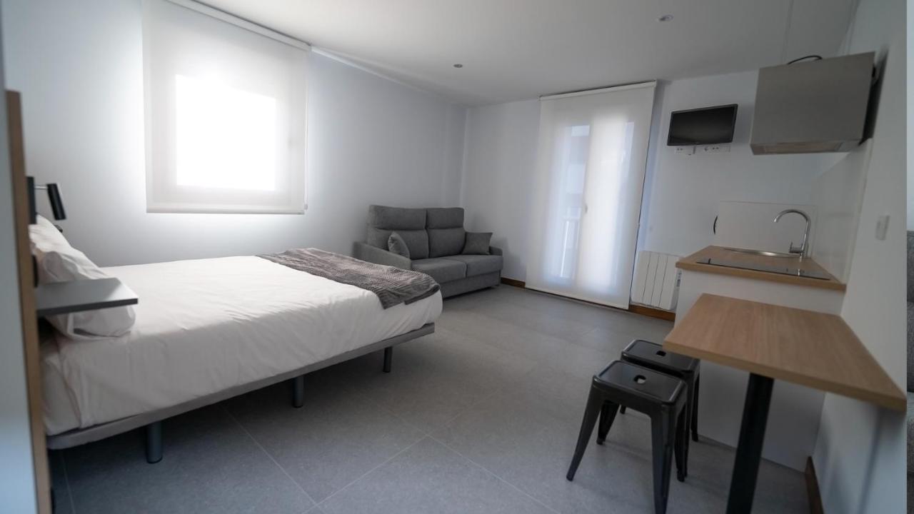 Apartamentos Puerta De Occidente Cornellana Eksteriør billede