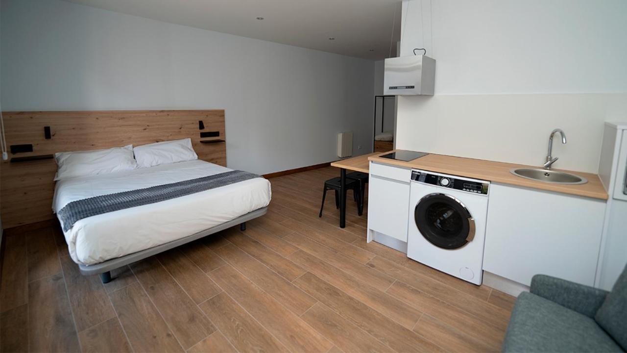 Apartamentos Puerta De Occidente Cornellana Eksteriør billede
