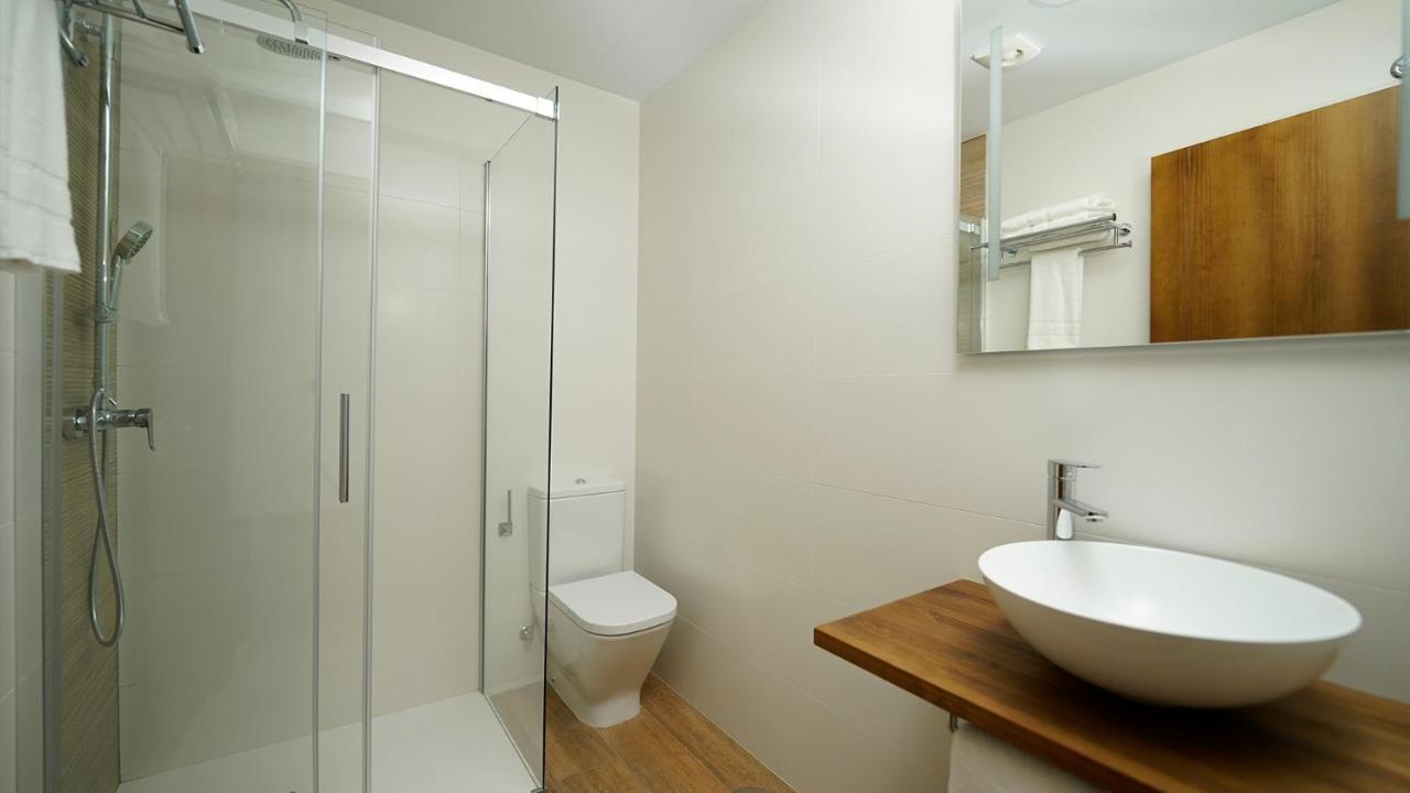 Apartamentos Puerta De Occidente Cornellana Eksteriør billede