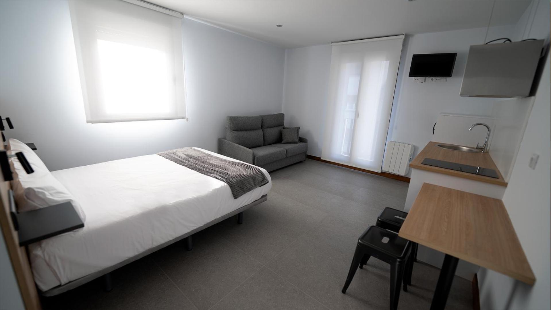 Apartamentos Puerta De Occidente Cornellana Eksteriør billede